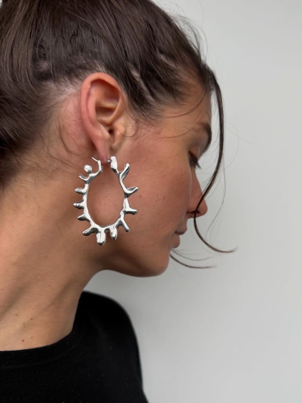 Coral Hoops in sterling silver, worn